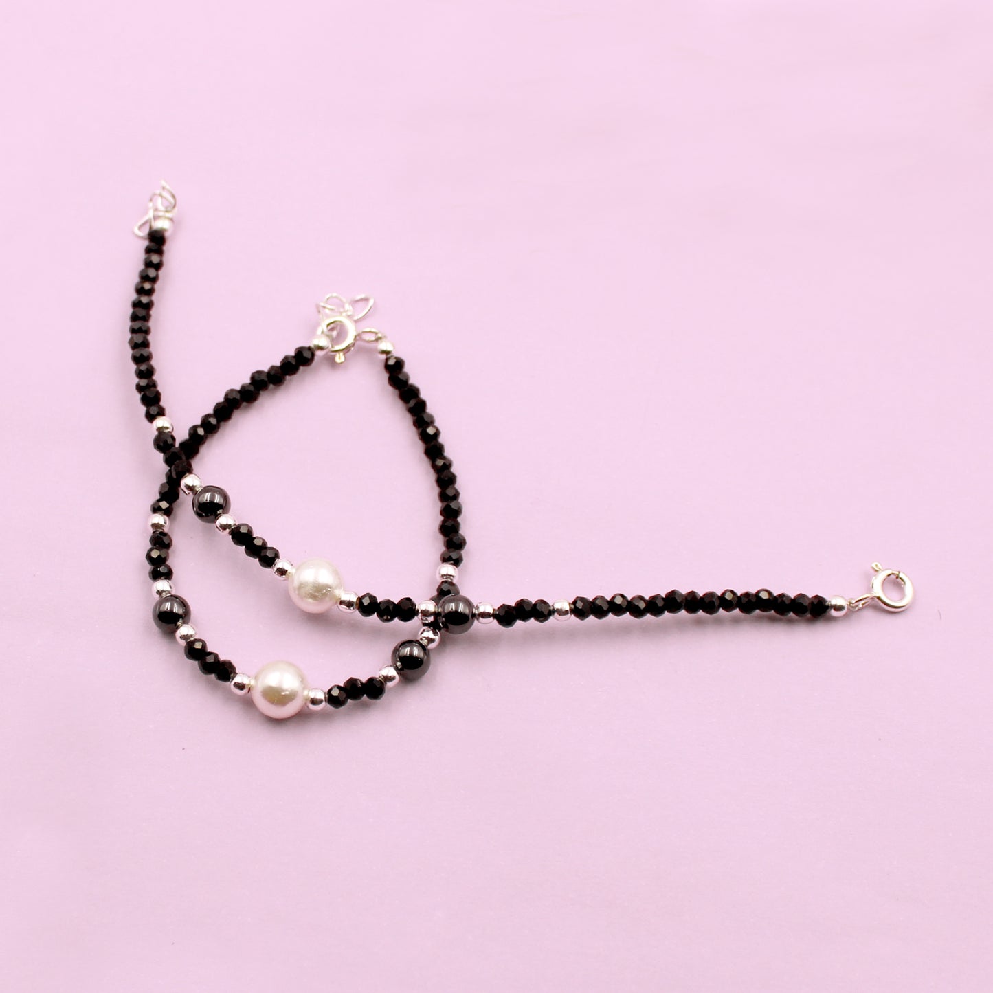 Pearl With Black Beads