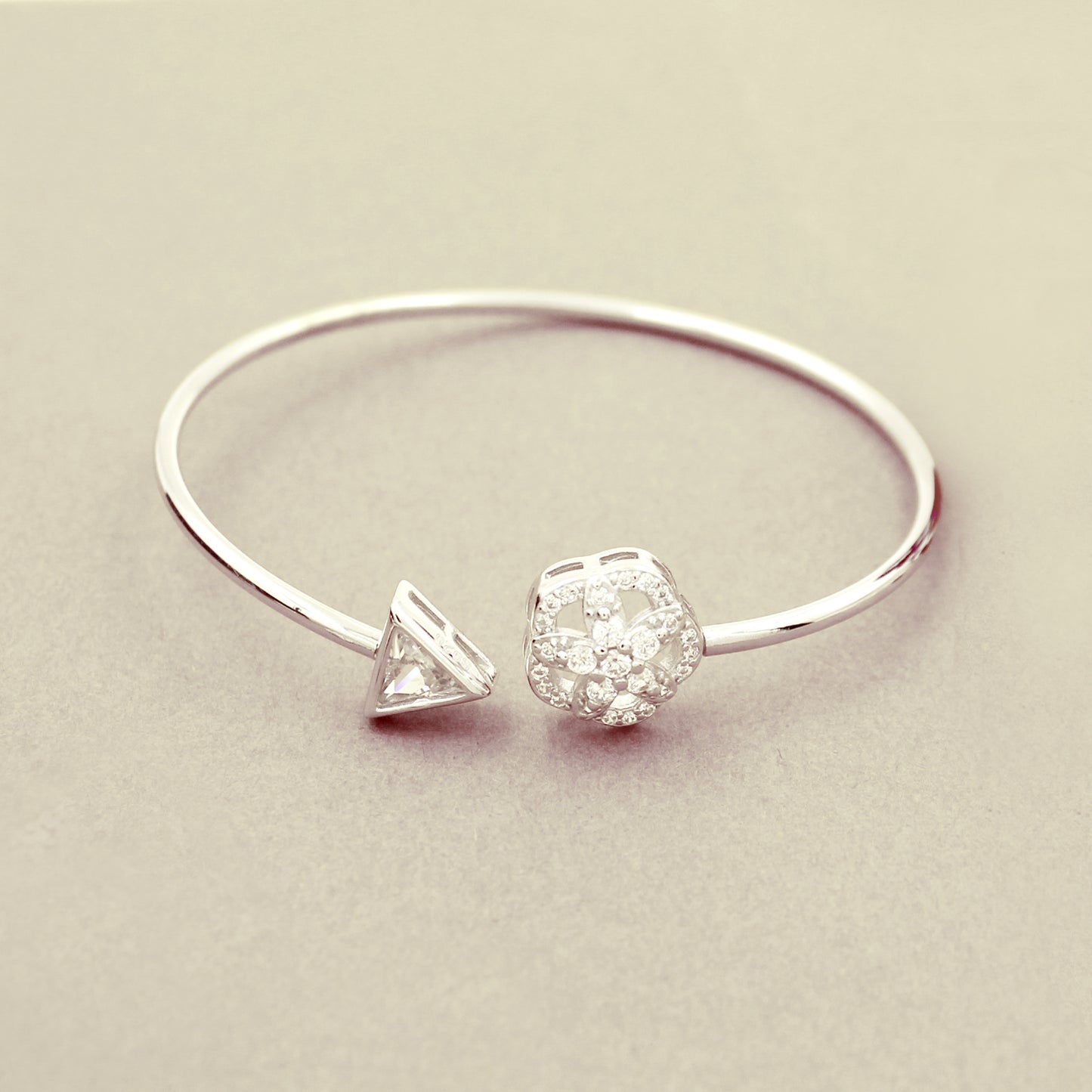 Studded Flower With Stone Triangle Kada Bracelet