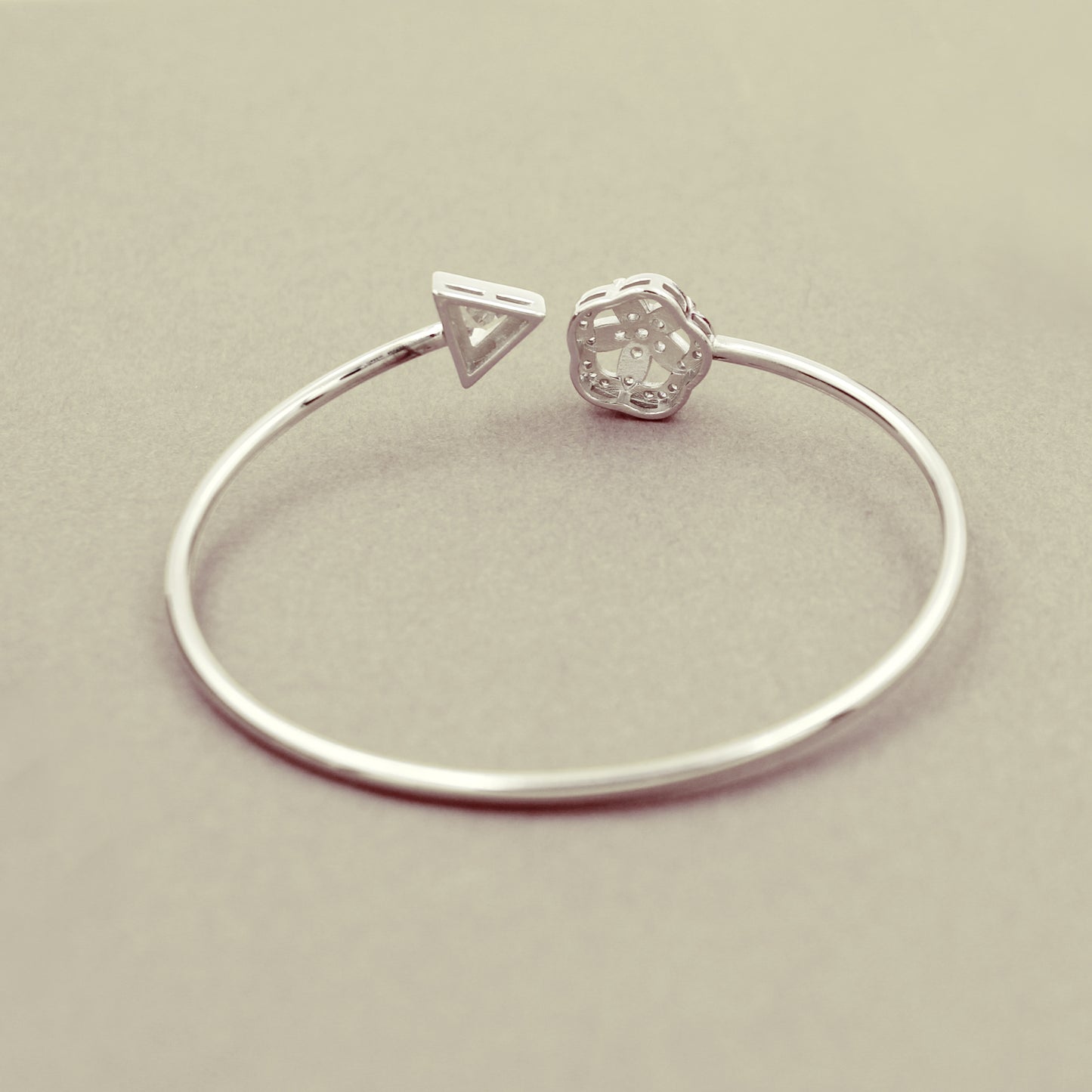 Studded Flower With Stone Triangle Kada Bracelet