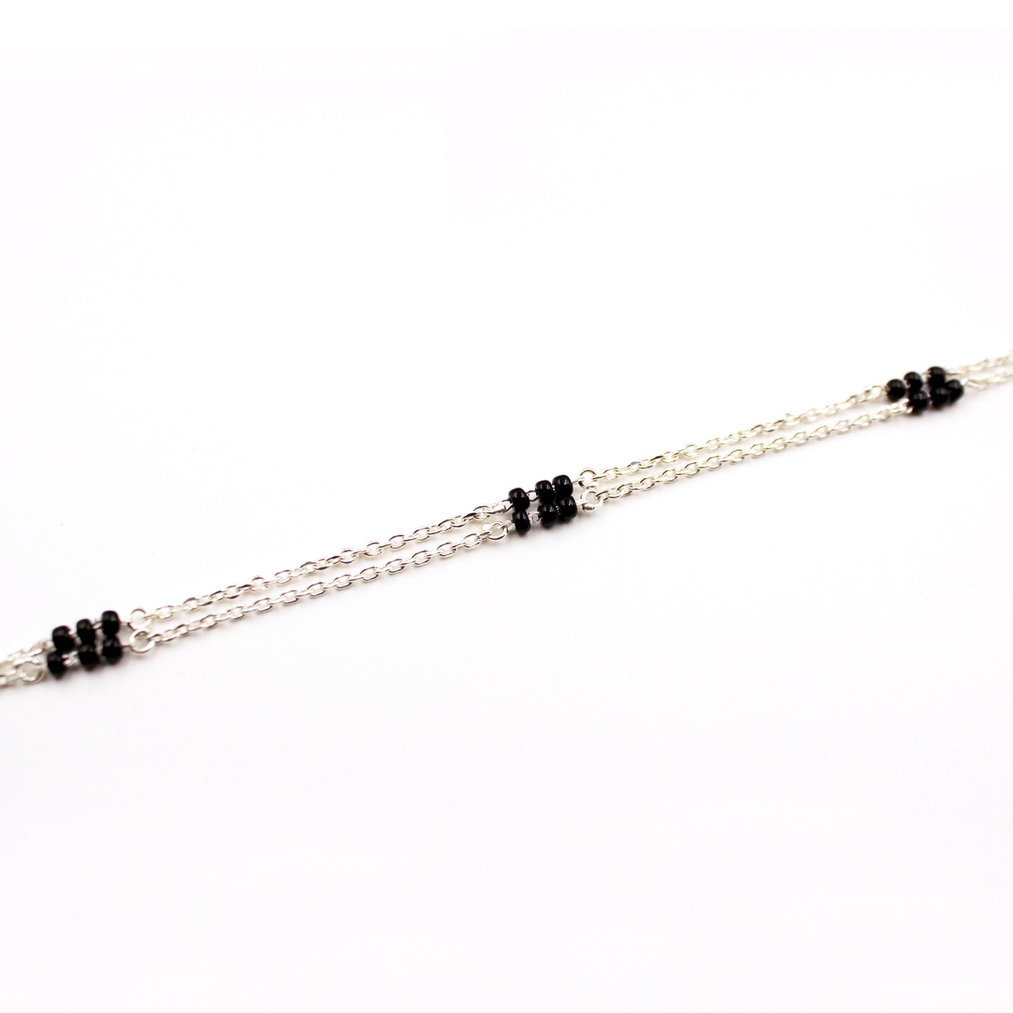 Silver Enchanted Knot With Stud Flower Magalsutra