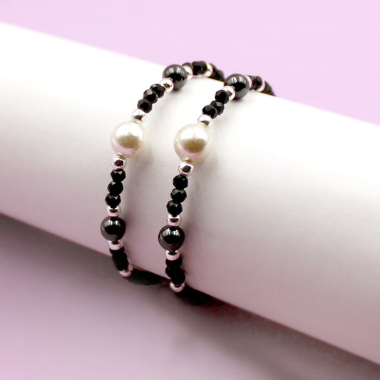 Pearl With Black Beads